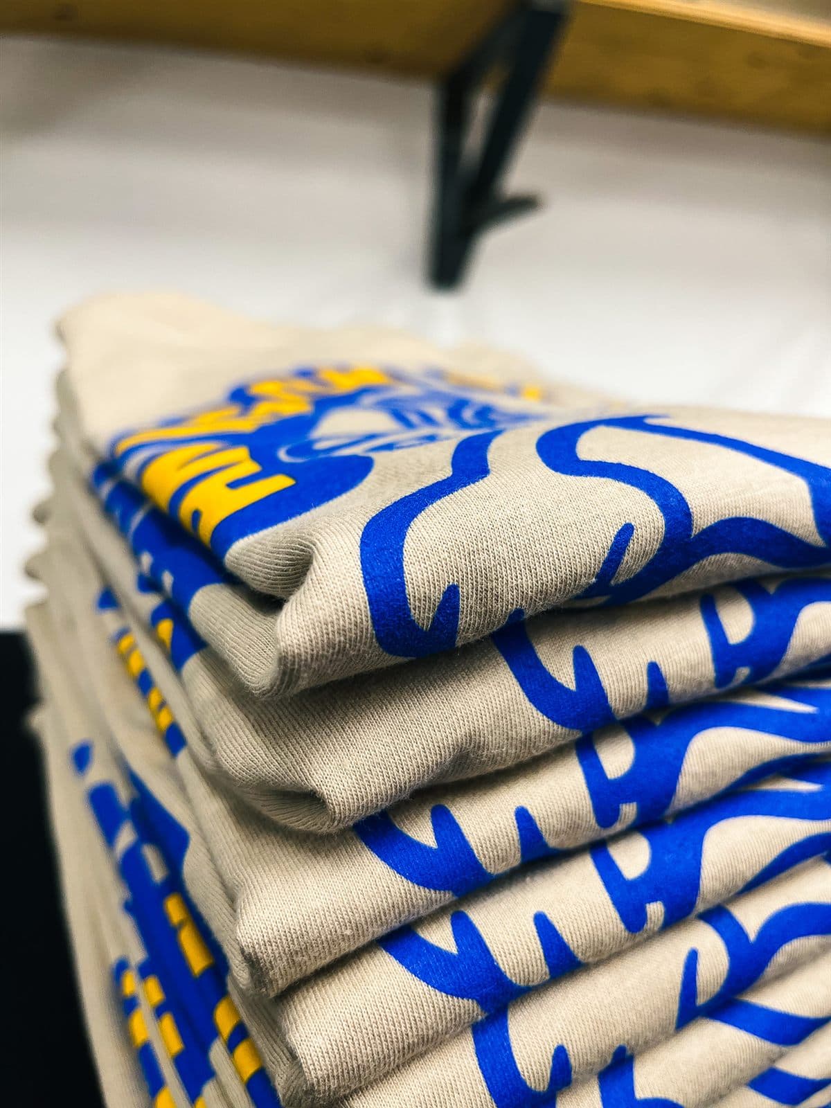 Stack of custom-printed apparel